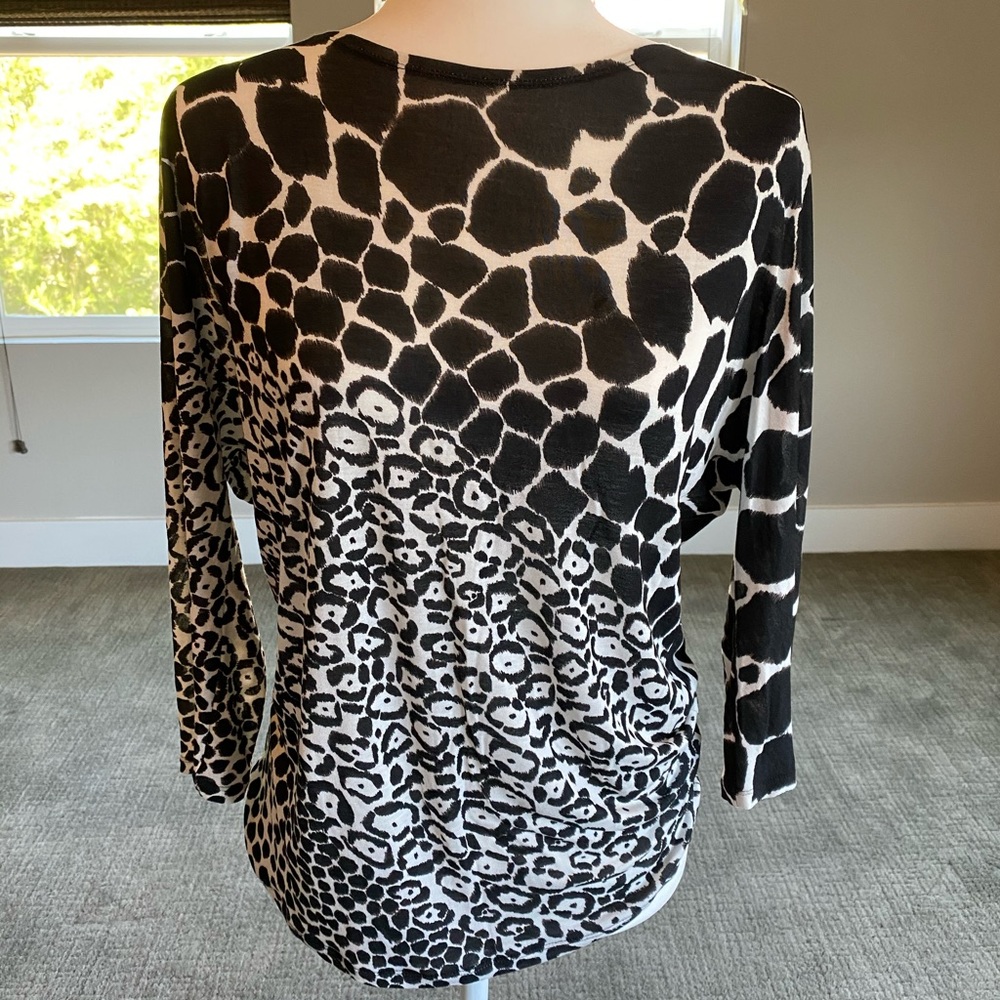 Gucci animal print blouse.